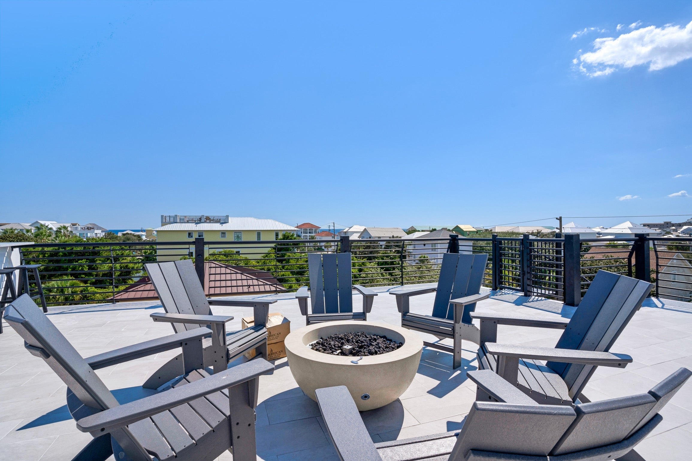 Relax around the roof top fire pit with wet bar and grill