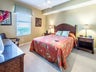 Generous guest bedroom w/queen bed