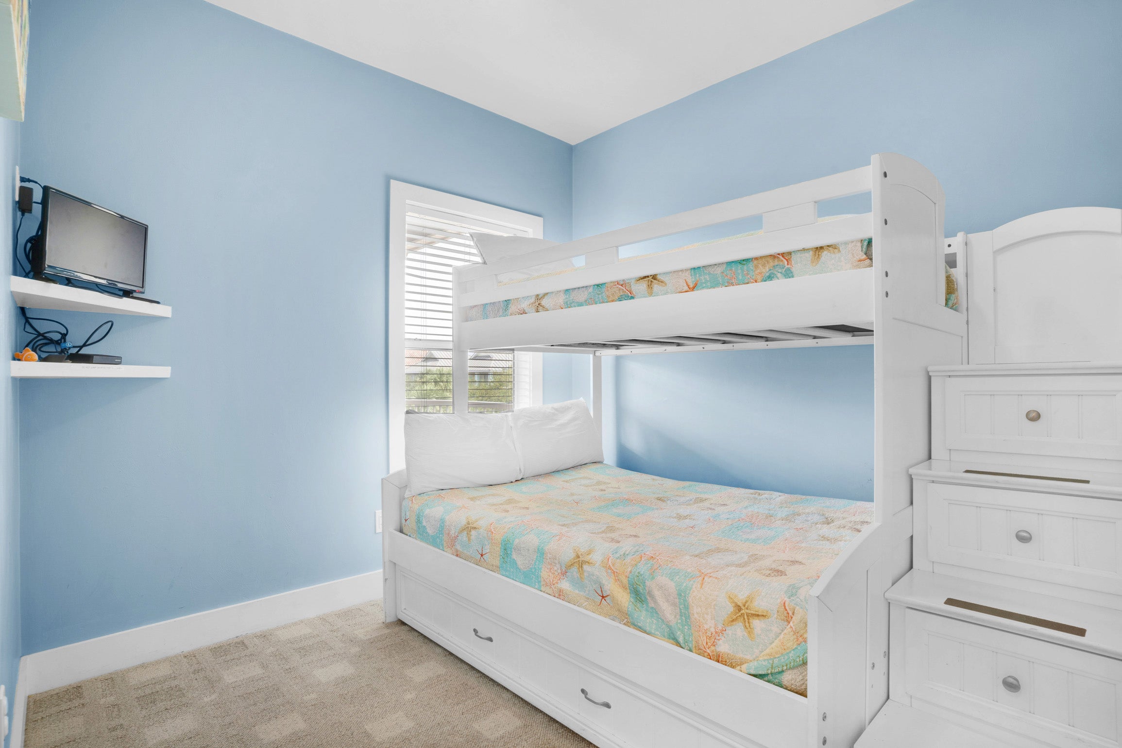 Twin over full bunkbed with a pull-out trundle