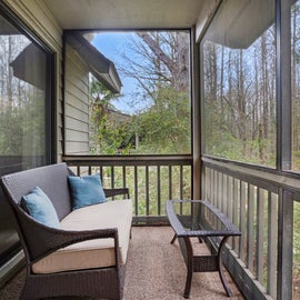 Relax on the screened in porch