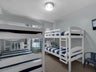 Bunk room with 2 sets of bunks