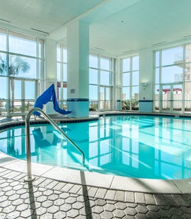 Large indoor pool with beach views