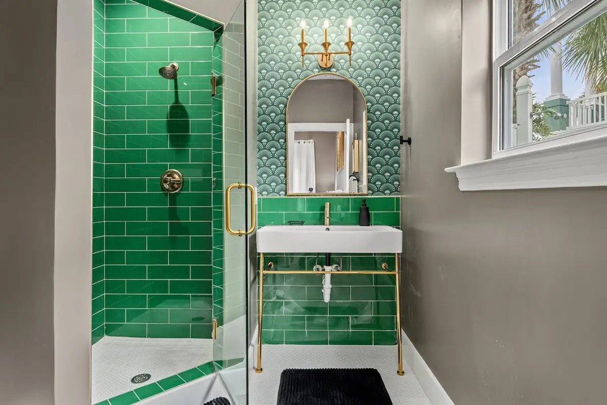 Guest bathroom with emerald green tile work