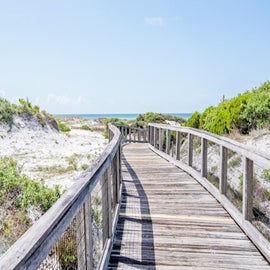 A stroll on the boardwalk gets you to the beach