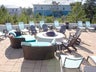 Relax by the fire pit at the Highland Parks pool