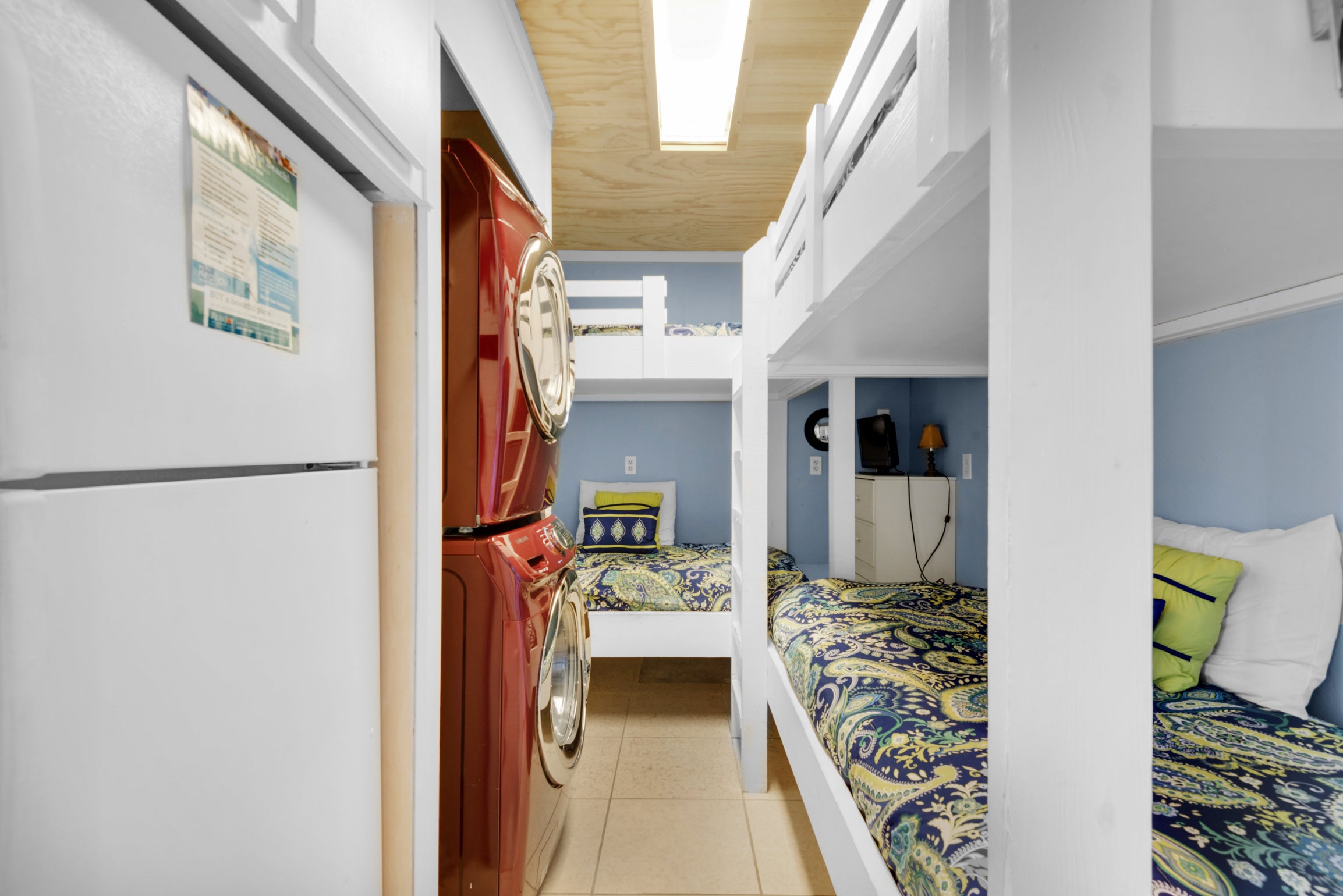 Bunk room with washer and dryer