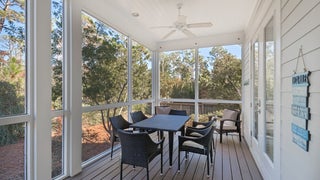 Enjoy a meal on the screened in patio