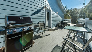 Huge Deck with Eating Areas and Gas Grill
