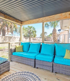 Relax on the screened in patio