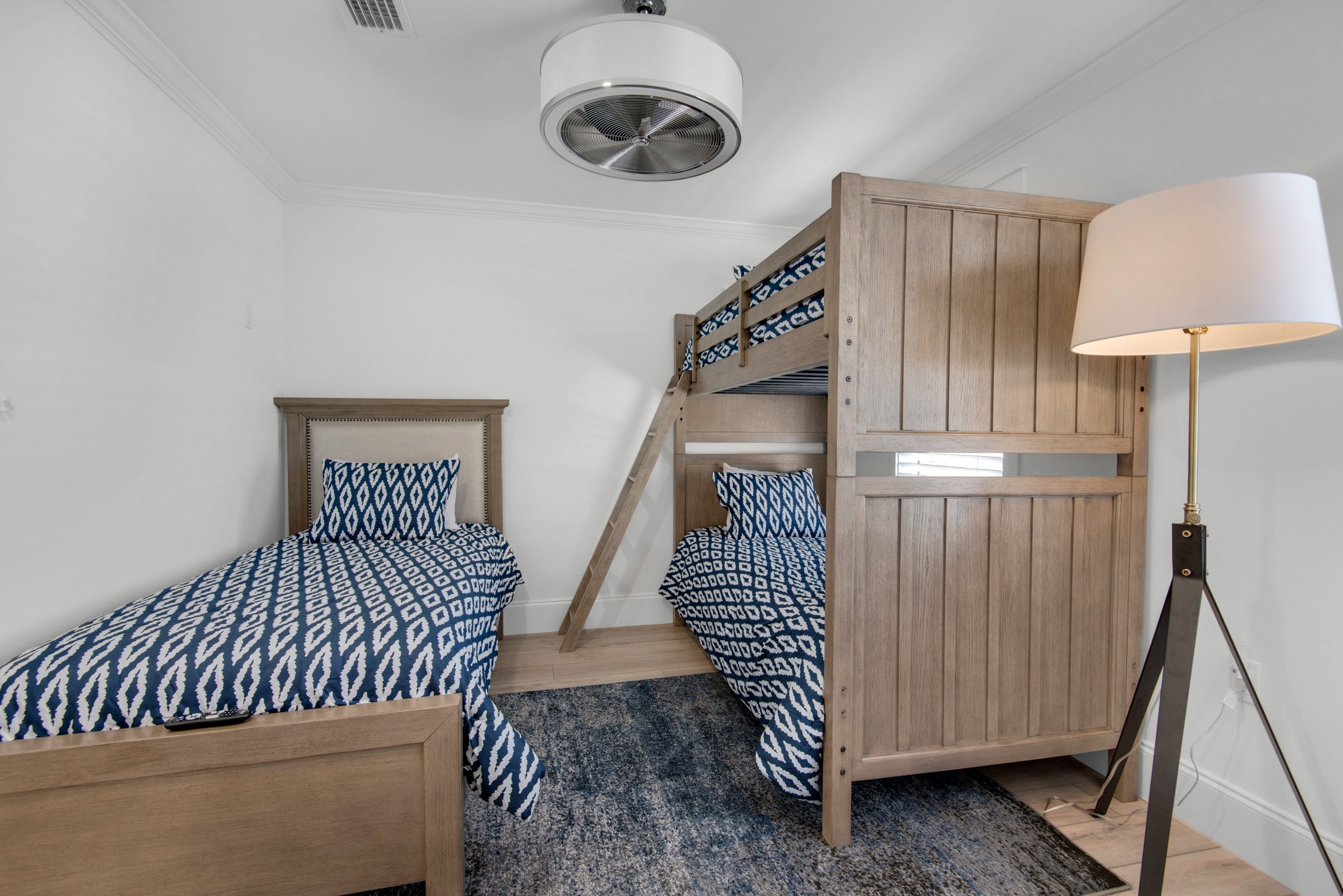 Bunk room with 3 beds