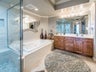 Dual sinks, jetted tub, seat in shower - wow!