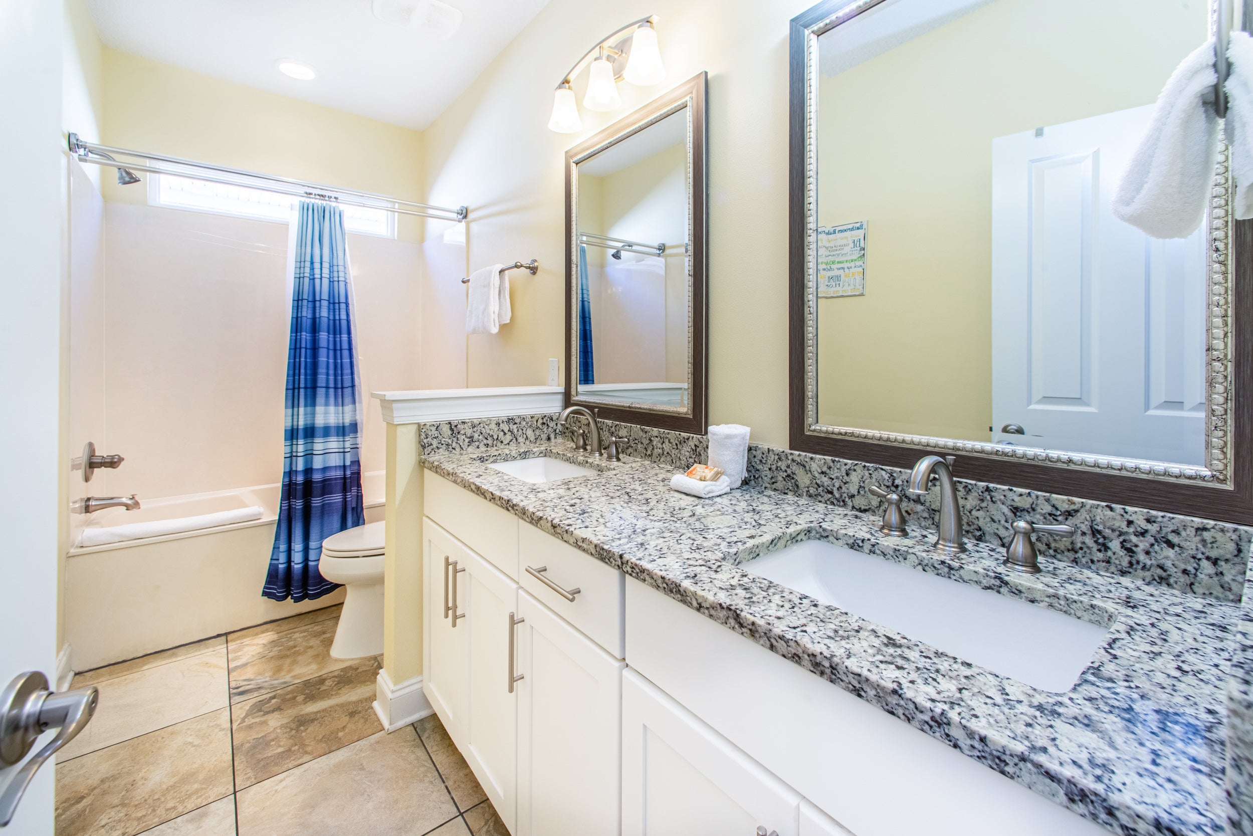 Shared bathroom with shower/tub combo!