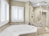 Master bathroom with jetted tub and walk-in shower