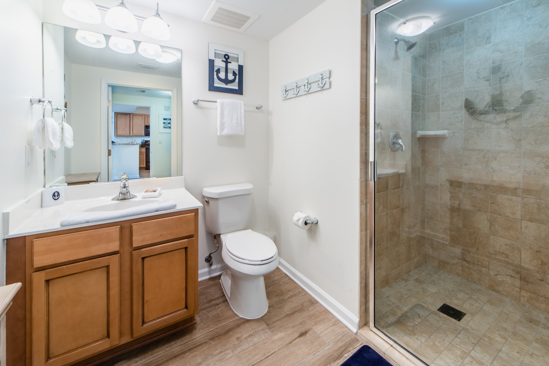 Guest Bath has large tiled Walk-In Shower