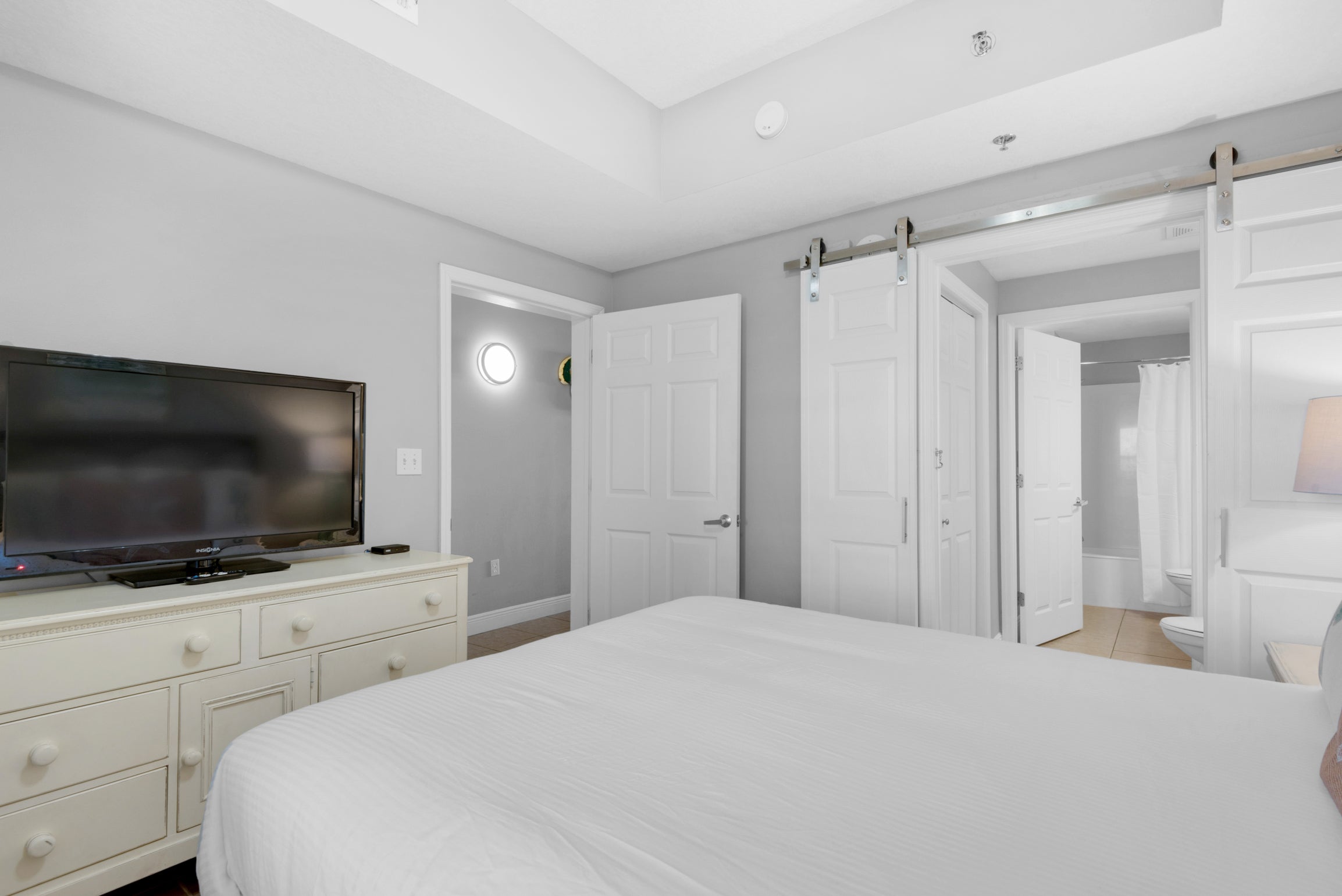 Master suite with large flat screen
