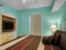 King Guest Bedroom with Flatscreen Tv