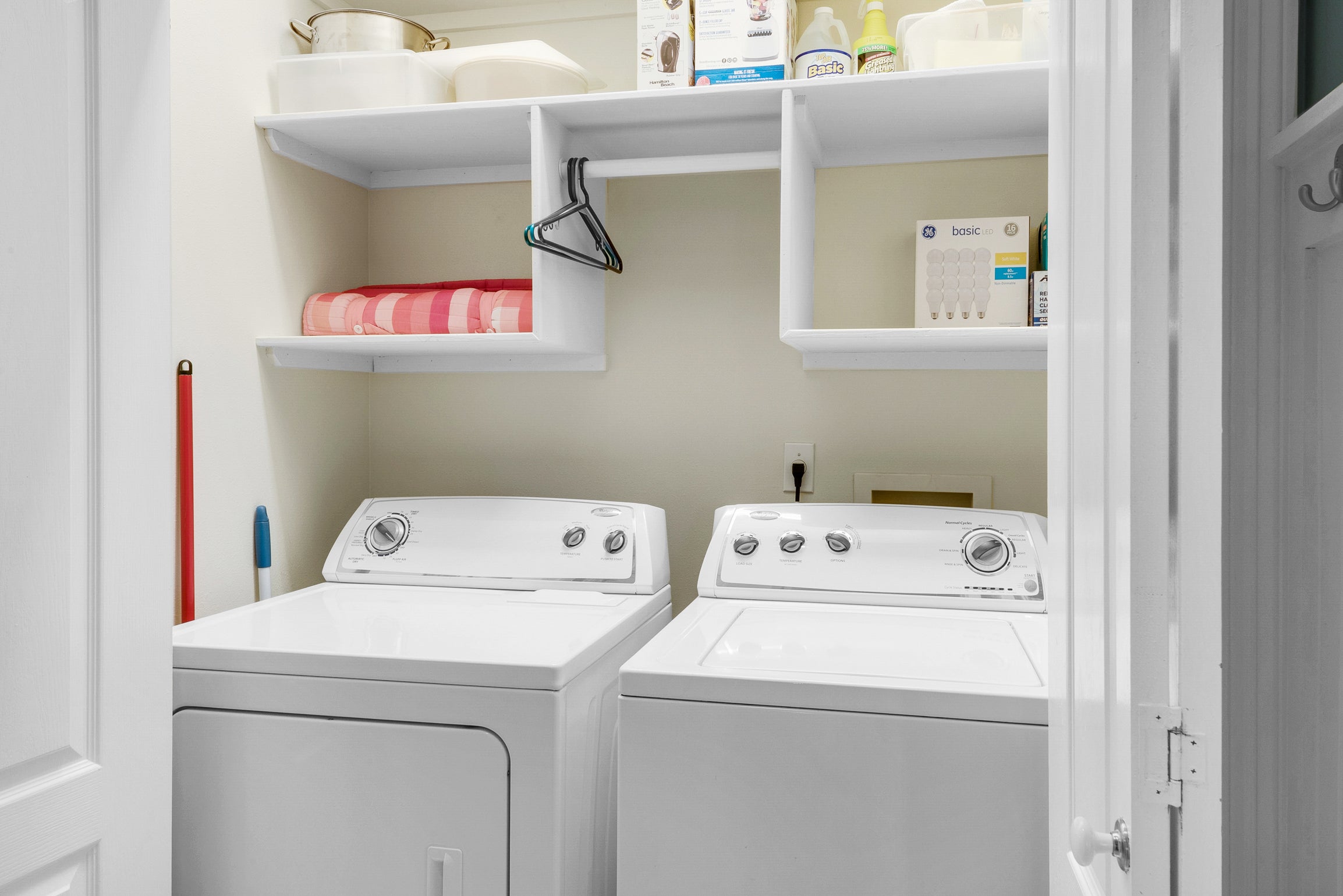 Laundry room with large capacity washer and dryer