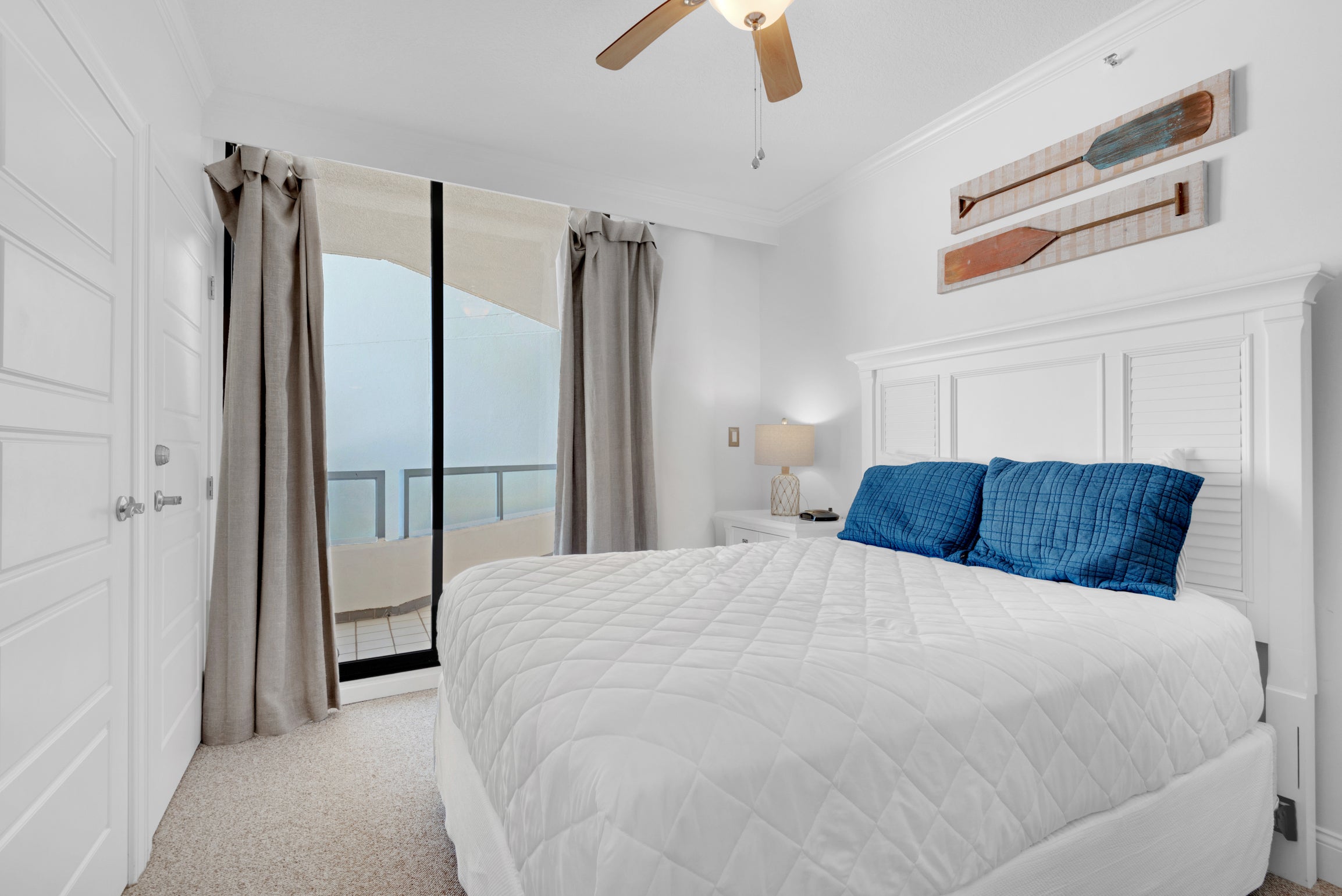Pretty Guest Bedroom with Balcony Access