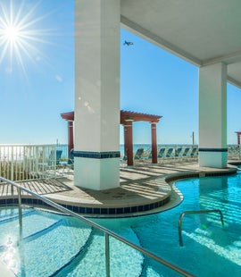 Indoor outdoor pool with beach views