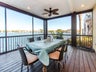 Enjoy a meal on the screened in porch