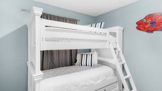 Bunk room with 2 bunks and a pull out bed
