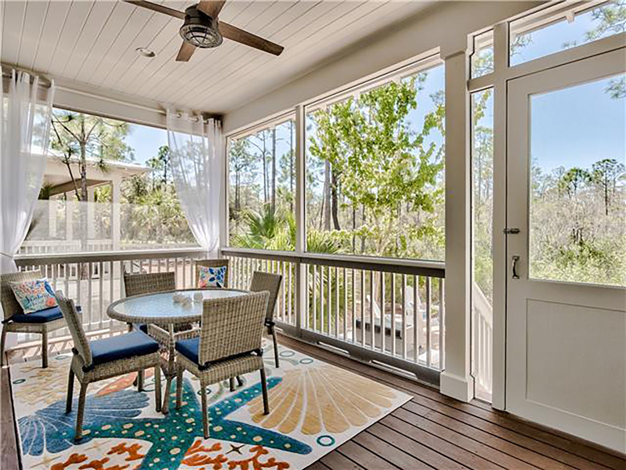 The screened porch has dining space for 6.