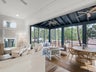 Enjoy the open doors to the screened in porch