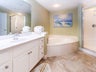 Master bathroom with walk-in shower and tub