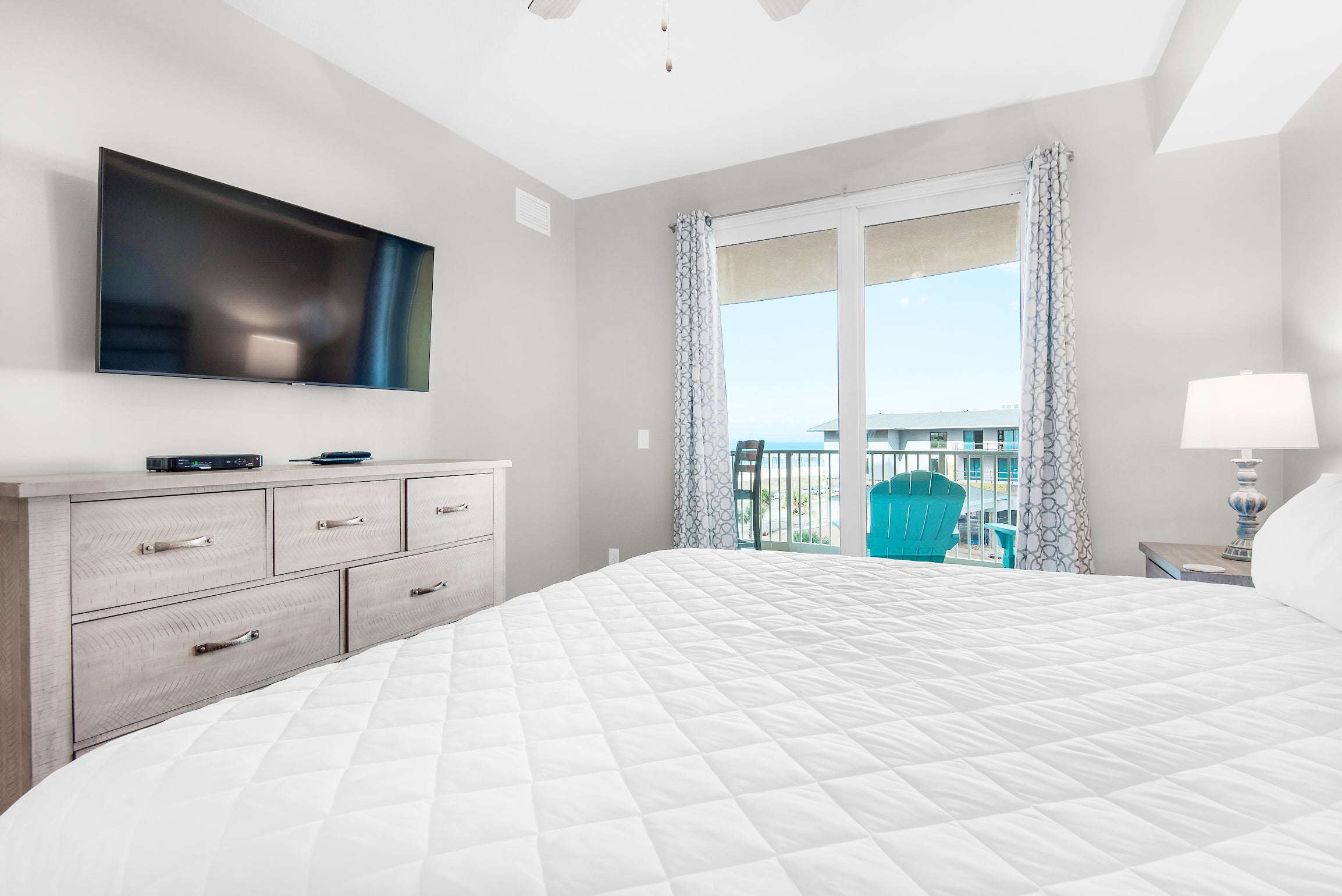 Master bedroom suite view with balcony access