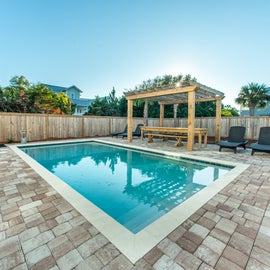 Beautiful Pool Deck with Lounges and Grill