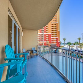 Step out on the balcony with pool and ocean views!