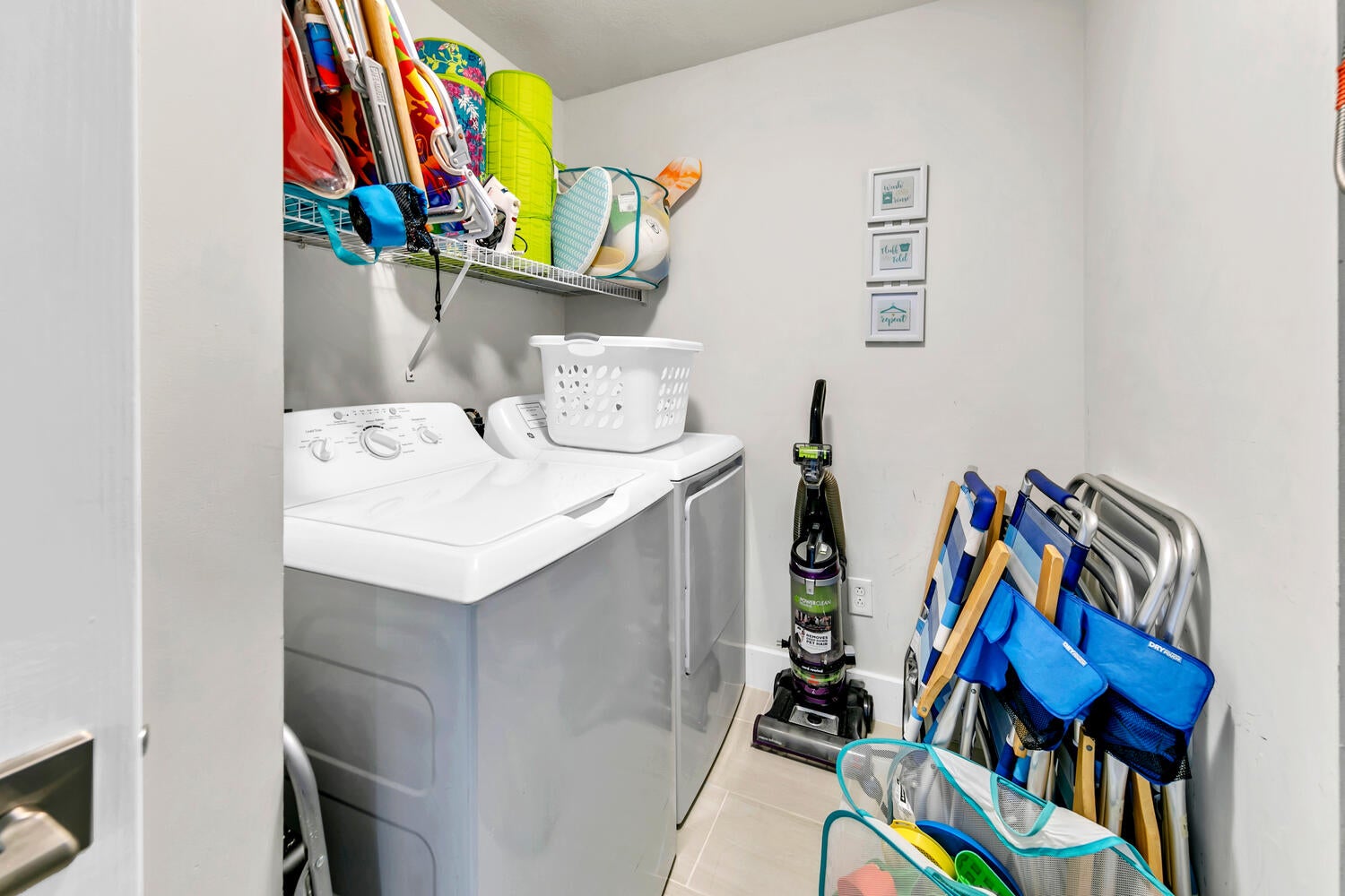 Laundry room with beach gear