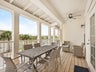 Large balcony with dining table at Reeled-In Retreat