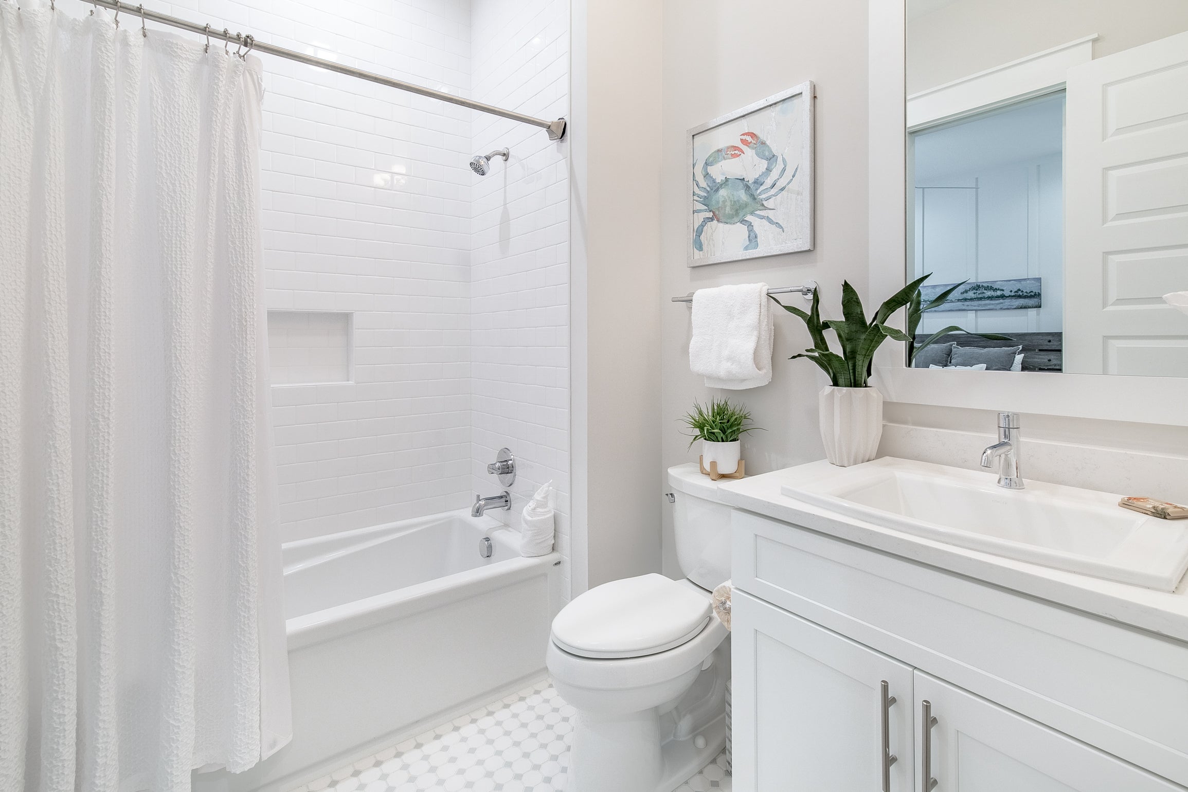 Full guest bath with shower-tub combo