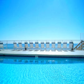 Picture yourself by this lovely Gulf front pool