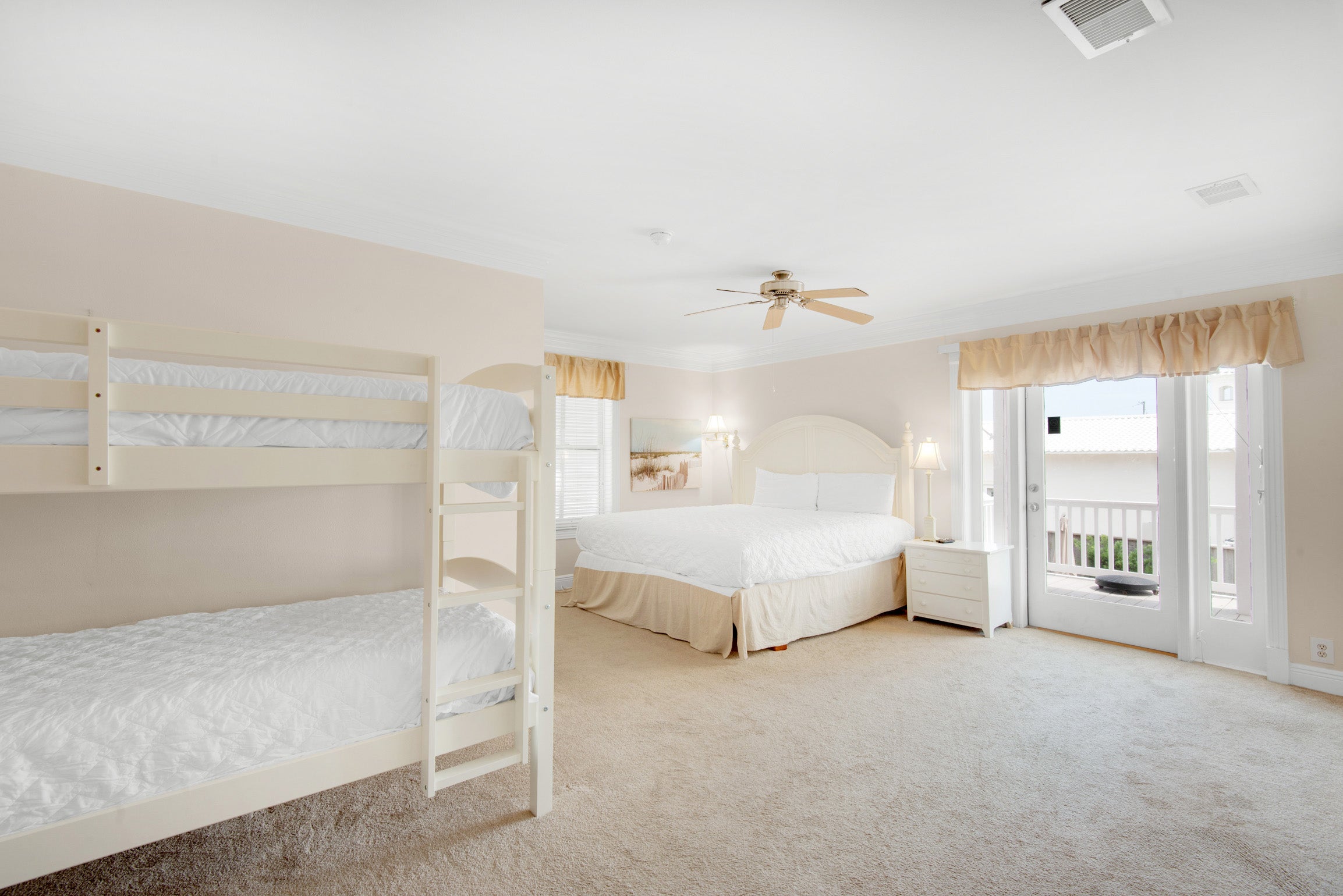 Large guest bedroom with 3 beds
