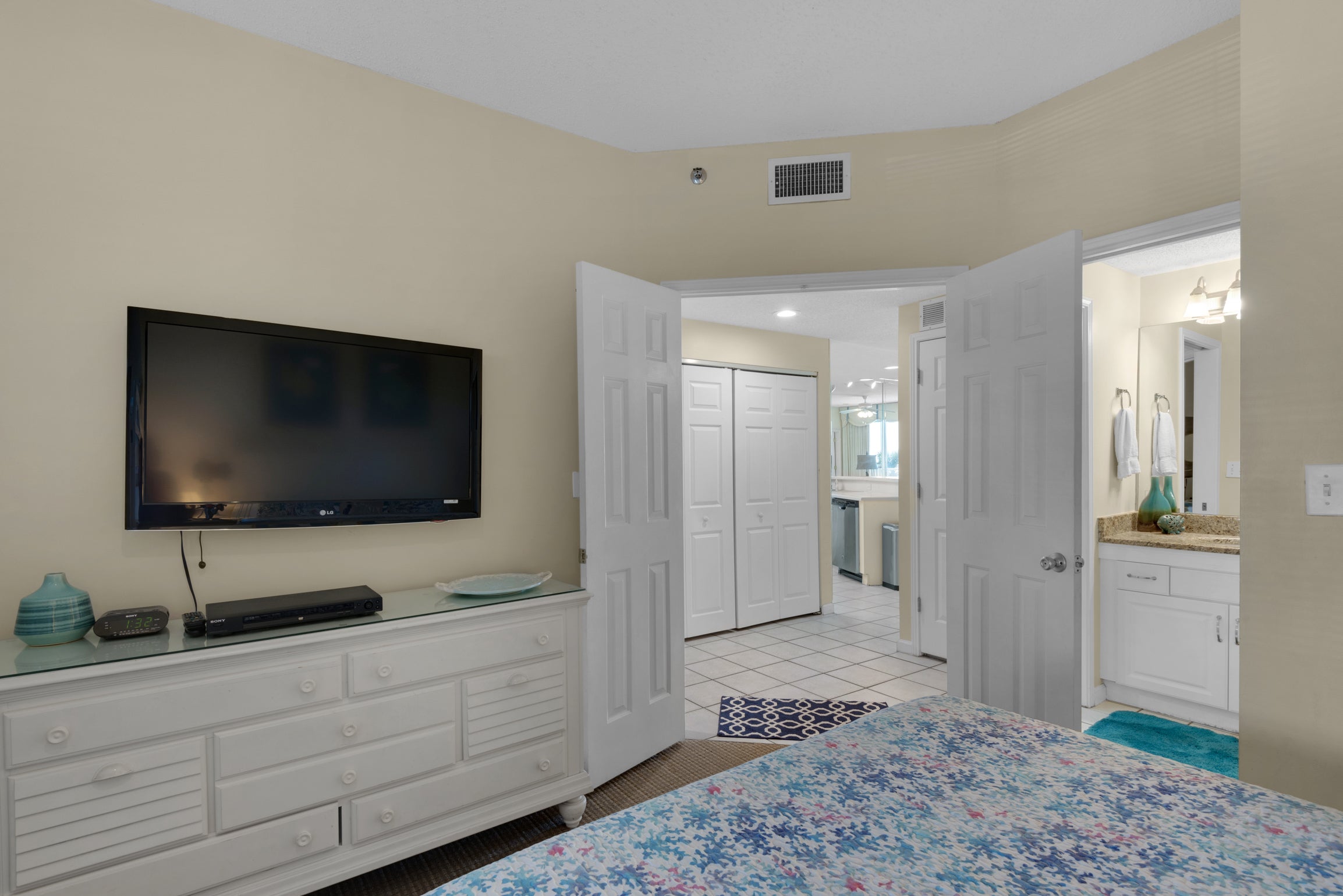 Guest bedroom with large flat screen TV