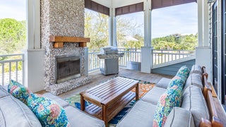 Stunning Oyster Shell fireplace on covered porch
