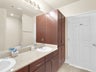Master bathroom with dual sinks
