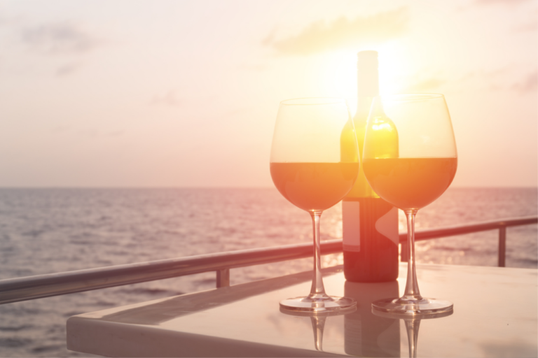 Dual wine glasses sunset